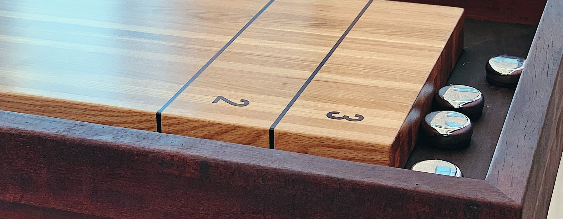 close-up of shuffleboard table