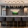 resident kitchen with bar tables and ample seating with TVs and modern decor