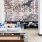 game room with large floral mural and spacious seating with a shuffleboard table